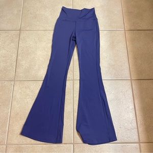 Women’s size small purple flare leg pants. Purple